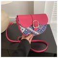 Detail of semicircular saddle bag featuring ethnic embroidery and golden buckle strap - Rose Pink