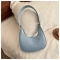 Detalle del bolso hobo azul claro en piel sintética con texto Fashion plateado - Azul