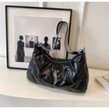 Black quilted down shoulder bag featuring a stylish black and white chevron wide strap - Black