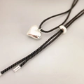 Polished silver heart pendant on a black twisted cord necklace with adjustable slider - Silver