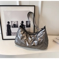 Silver quilted half-moon shoulder bag with striped woven strap and metallic finish - Silver