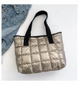 Champagne gold quilted puffer tote bag with black wide straps and spacious interior - Champagne