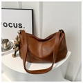 Detailed view of brown retro leather tote bag with pleated texture and rabbit charm - Brown with Pendant