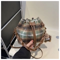 Detail of green and brown plaid wool bucket bag with drawstring and plush charm - With Plush Pendant Style / Green