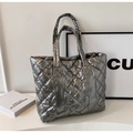 Quilted silver puffer tote bag with metallic finish and spacious padded design - Silver