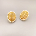 Elegant oval earrings with sparkling cubic zirconia and white pearls on gold metal base - Oval
