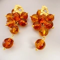 Elegante tros oorbellen met amberkleurige kralen en vergulde details in vintage stijl - Granaatrood