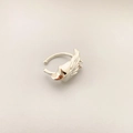 Silberne Ohrmanschette in Flügelform mit 18K Gold Plattierung und kleinem Zirkon - Weißgold