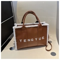 Borsa tote vintage in pelle marrone con bordo in peluche bianco e logo TENGYUE stampato - Marrone