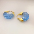 Chic blue resin hoop earrings with gold foil accents and polished metal links - Blue