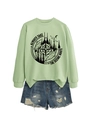 Detail of mint green sweatshirt with mountain print paired with ripped denim shorts - Olive Green (Black Print)