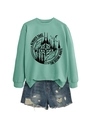 Detail of mint green mountain graphic sweatshirt paired with distressed denim shorts - Light Green (Black Print)