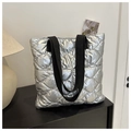 Chic silver quilted puffer tote bag with black straps and trendy bucket style - Silver