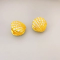 Macro detail of gold fan-shaped shell earrings with pave-set zircon stones and secure clasp - Gold