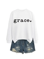 Detail of white grace heart print sweatshirt and distressed denim shorts with frayed hems - White Sweatshirt (Black Font)