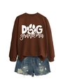 Detail of Dog Grandma sweatshirt with paw print design and distressed denim shorts - Coffee