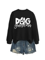 Flat lay of Dog Grandma sweatshirt paired with distressed denim shorts on white background - Black