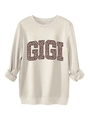 Détail du logo GIGI imprimé léopard sur un sweat-shirt épais en polaire crème doux - S / Sable