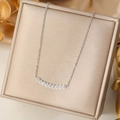Elegant silver smile necklace with sparkling cubic zirconia on a premium gift box - Silver
