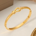 Elegant gold-tone titanium steel cuff bracelet featuring detailed Great Wall pattern - Horseshoe Buckle Style (SZ69) / Gold