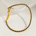 Bracciale intrecciato nero con perline dorate e ciondolo lettera K su ceramica bianca - Cordino Nero Piccolo / Oro (K)