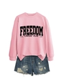 Detail of pink cotton sweatshirt with Freedom print and distressed denim shorts set - Pink Sweatshirt (Black Font)