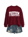 Detail of burgundy Freedom sweatshirt with white text and distressed denim shorts - Wine Red Sweatshirt (White Font)