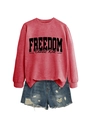 Detail of red Freedom Charlie Kirk sweatshirt paired with distressed denim shorts - Red Sweatshirt (Black Font)