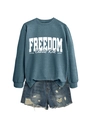 Detail of the high-quality screen-printed Freedom Charlie Kirk text on a blue sweatshirt - Blue Sweatshirt (White Font)