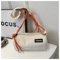Detail of cream corduroy cylinder bag with colorful braided rope shoulder strap - Off White