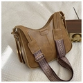 Detail of vintage brown crossbody bag with wide geometric patterned shoulder strap - Khaki