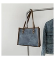 Retro large capacity tote bag in washed dark denim with brown leather trim and gold studs - Blue
