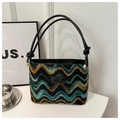 Detail of colorful wavy pattern shoulder bag with black leather handle and logo patch - Black
