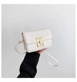 Elegant cream white square flap bag with gold geometric lock and thin leather shoulder strap - White