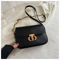Classic black flap crossbody bag featuring a golden geometric lock and chain strap - Black