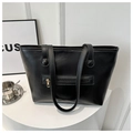 Minimalist black leather tote bag featuring a rear zipper pocket and double shoulder straps - Black