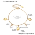 Detailansicht goldener Edelstahl-Herz- und Zirkonia-Kreuzanhänger mit Abmessungen - Goldenes Herz Armband / 16+5cm