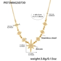 Detail van gouden ster hanger ketting met zirkoon inlays en afmetingen op witte achtergrond - Gouden Achtpuntige Ster Zirkonia Ketting (P073)