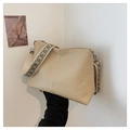 Beige faux leather bucket bag featuring a vibrant ethnic style embroidered wide strap - Khaki