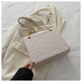 Chic beige quilted crossbody bag with 3D geometric pattern and gold chain strap - White