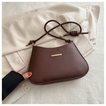 Minimalist dark brown leather underarm bag with unique knotted rope strap and gold accents - Brown