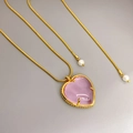 Pink heart crystal pendant necklace with gold snake chain and pearl accents - Gold