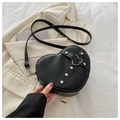Chic black heart-shaped crossbody bag with silver studs and matte leather finish - Black