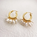 Detail of 18K gold-plated brass hoop earrings with multiple clustered teardrop pearls - Gold Pearl Earrings