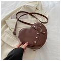 Dark brown heart-shaped crossbody bag with rivet details and silver heart clasp - Brown