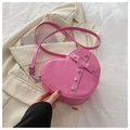 Pink heart-shaped crossbody bag with silver rivet details and adjustable strap - Pink