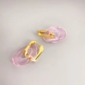 Modern U-shaped gold earrings featuring translucent pink oval resin pendants - Pink