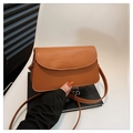 Brown leather crossbody bag with crocodile texture detail and adjustable strap - Brown