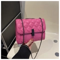 Detail of pink quilted leather small square bag with black metal chain and twist lock - Rose Pink
