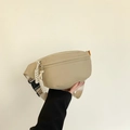 Minimalist beige nylon waist bag featuring a distinctive woven rope zipper pull - Khaki